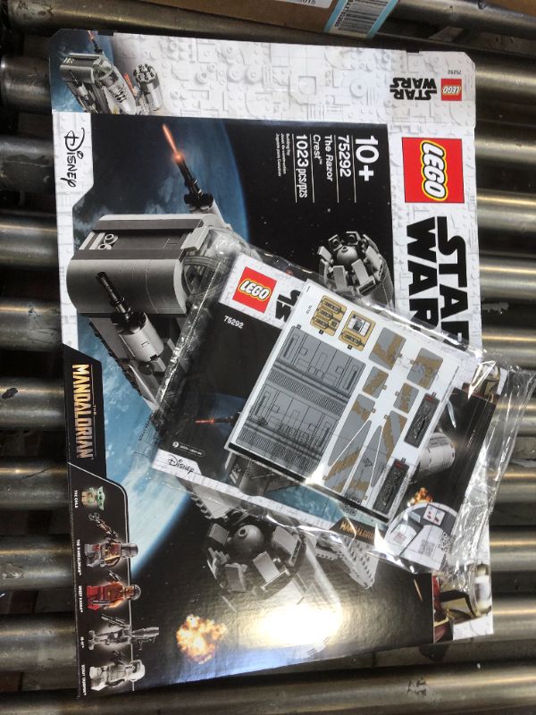 Photo 4 of LEGO Star Wars: The Mandalorian The Razor Crest 75292 Exclusive Building Kit, New 2020 (1,023 Pieces)