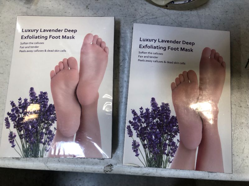 Photo 2 of Foot Peel Mask 2 Pack, Peels Away Calluses and Dead Skin Cell, Calluses and Lavender Deep Moisturizing Foot Mask, Exfoliating Peeling Natural Treatment
