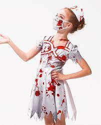 Photo 1 of IKALI WOMEN ZOMBIE NURSE COSTUME SIZE LARGE 3 PCS