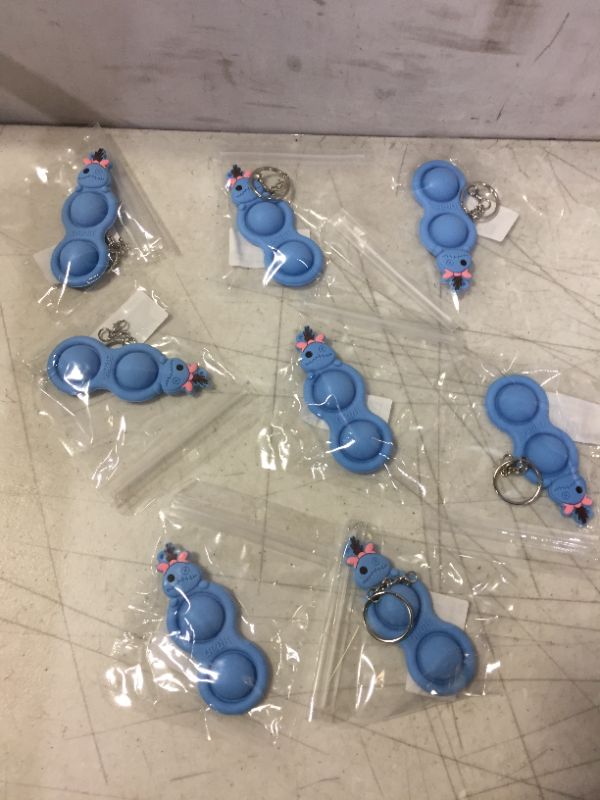 Photo 1 of KEYCHAIN FIDGET POPPERS 