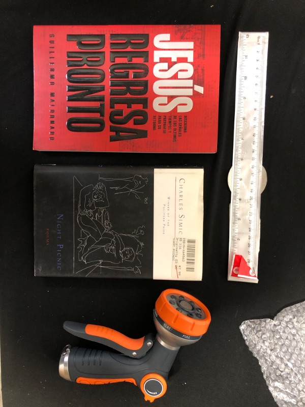 Photo 1 of Assorted items, hose head, 2 books, a standard ruler
