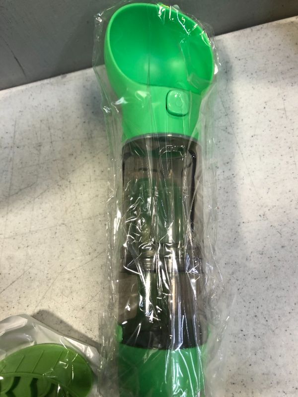 Photo 1 of  PET MULTIFUNCTIONAL  GREEN WATER BOTTLE ( PACKAGE WAS SEALED BUT OPEN FOR LIVE PHOTO )