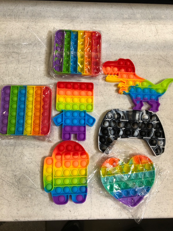 Photo 1 of bundle of fidget poppers 