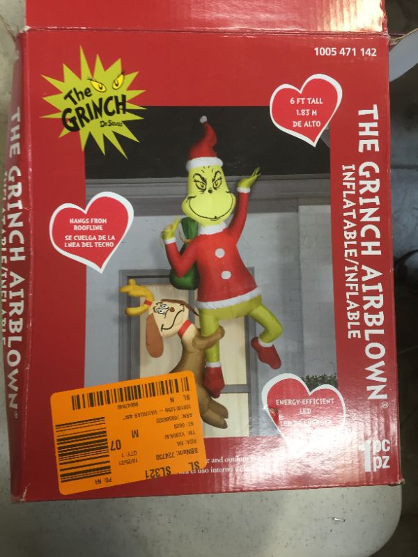 Photo 1 of Dr. Seuss™ Hanging Grinch with Max 72-Inch Inflatable Lawn Decor