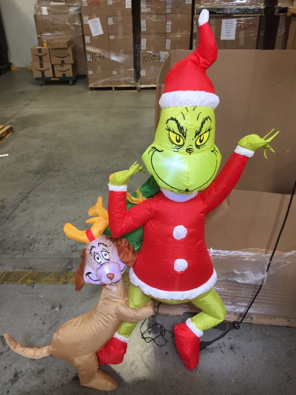 Photo 2 of Dr. Seuss™ Hanging Grinch with Max 72-Inch Inflatable Lawn Decor