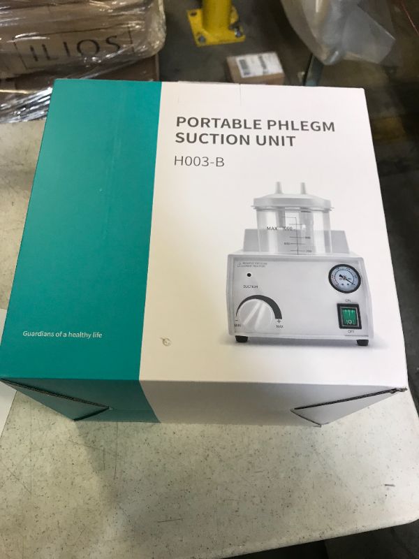 Photo 1 of portable phlegm suction machine