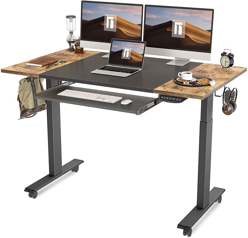 Photo 1 of FEZIBO 55-Inch Dual Motor Height Adjustable Electric Standing Desk with Keyboard Tray, Sit Stand Table with Splice Board, Black Frame/Rustic Brown and Black Top (brand new in box) box was damaged during transport. 