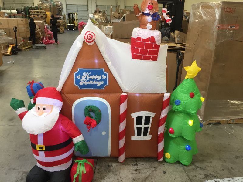 Photo 2 of 7.2 ft. W x 7 ft. H Christmas Inflatable Gingerbread House with Santa Clause Holiday Decoration, Fun Internal LED Lights
