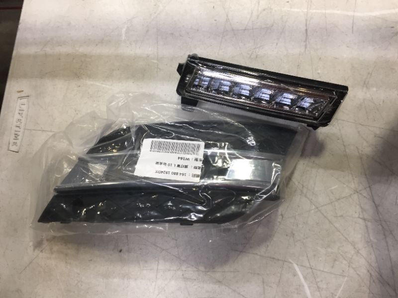 Photo 2 of 2008-13 Mercedes Benz W164 left side daytime running light trim 
