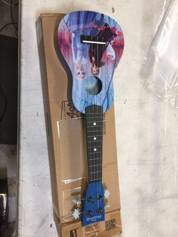 Photo 2 of First Act Discovery Frozen 2 Ukulele (Small Kids Guitar with Four Strings)
