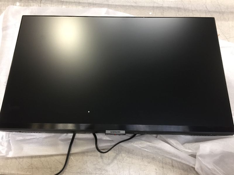 Photo 2 of Samsung - AM500 Series 24" IPS LED FHD Smart Tizen Monitor with Streaming TV - Black---VERY SMALL SCRATCH ON SCREEN---
