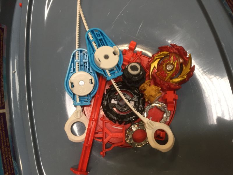 Photo 2 of BEYBLADE Burst Surge Speedstorm Motor Strike Battle Set -- Battle Game playset with Motorized Stadium, 2 Battling Top Toys and 2 Launchers
