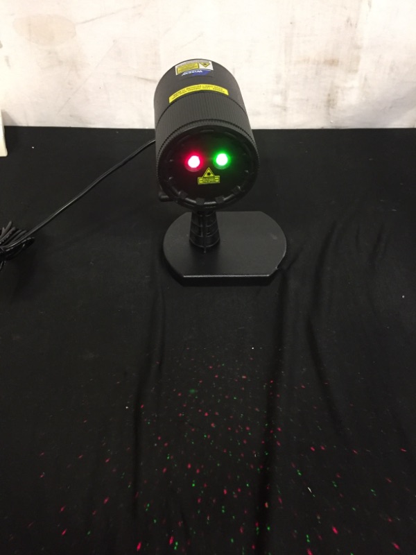 Photo 2 of  Laser Lights with Green Christmas Tree and Red Stars, Class IIIA, 2.0mW Power, Projection Lights for Christmas, Holiday, Party, and Garden Decoration