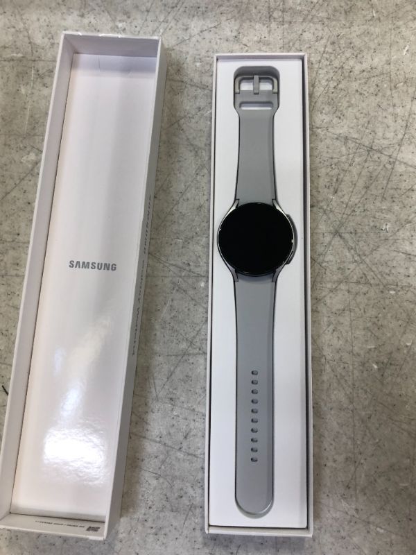 Photo 3 of SAMSUNG Galaxy Watch 4 44mm Smartwatch with ECG Monitor Tracker LTE US Version, Silver with Samsung Silicone Watch Band Strap
