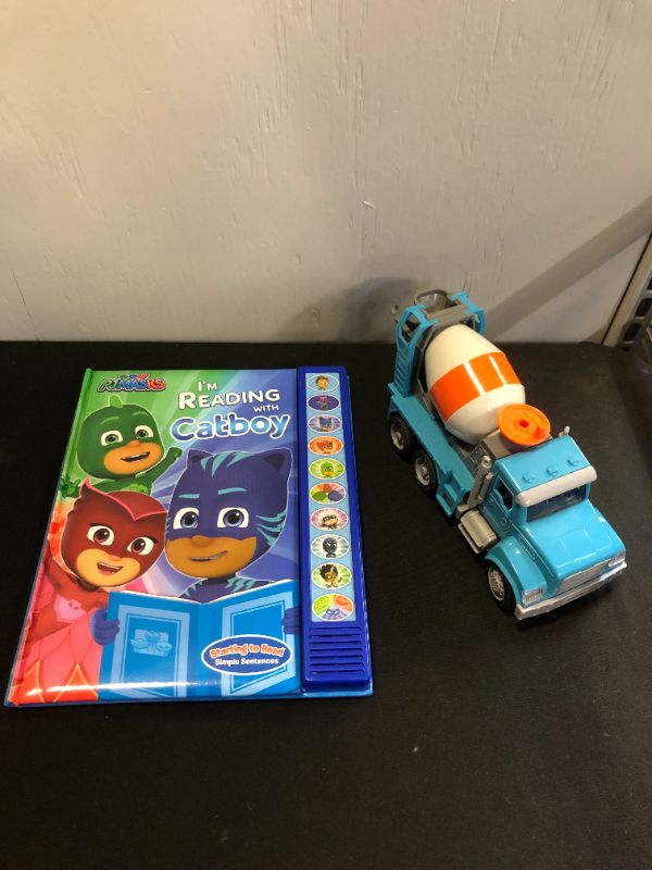 Photo 1 of KIDS TRUCK TOY AND BOOK