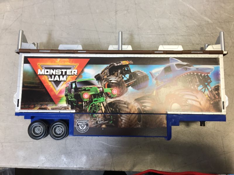 Photo 2 of Monster Jam, Official 2-in-1 Transforming Hauler Playset with Exclusive 1:64 Scale El Toro Loco Die-Cast Monster Truck Toy