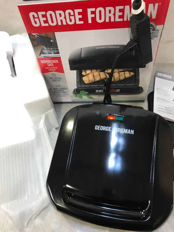 Photo 2 of George Foreman 4-Serving Removable Plate Electric Grill and Panini Press, Black, GRP1060B