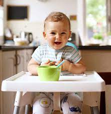 Photo 1 of high chair - goes on table 