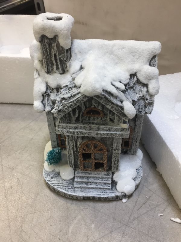 Photo 1 of CHRISTMAS STATUE DECORATION OF SNOWY HOUSE (5.5W X8HX4D INCHES) 