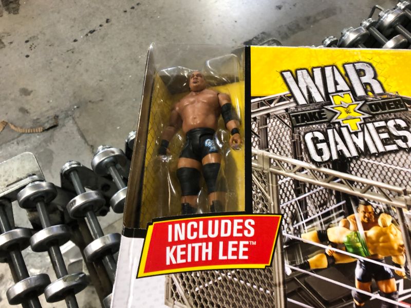 Photo 2 of ?WWE NXT Takeover War Games Playset with 2 NXT Rings, Keith Lee Action Figure, 2 Connecting Cages with Breakaway Pieces, 2 Ladders, Chair, Table & More; for Ages 6 Years Old & Up
