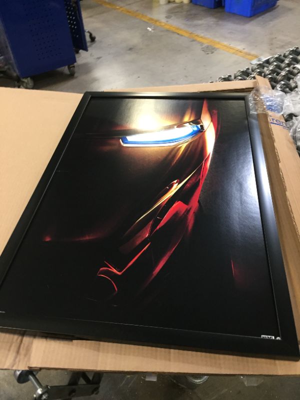 Photo 1 of 36"x24" iron man picture with frame 