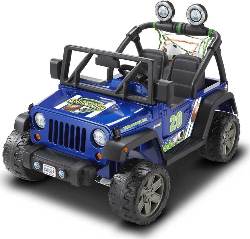 Photo 1 of Power Wheels Gameday Jeep Wrangler, sports-themed battery-powered ride-on vehicle with practice net and 3 ball