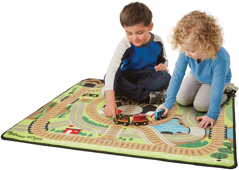 Photo 1 of Melissa & Doug Round the Rails Train Rug With 3 Linking Wooden Train Cars (39 x 36 inches)
