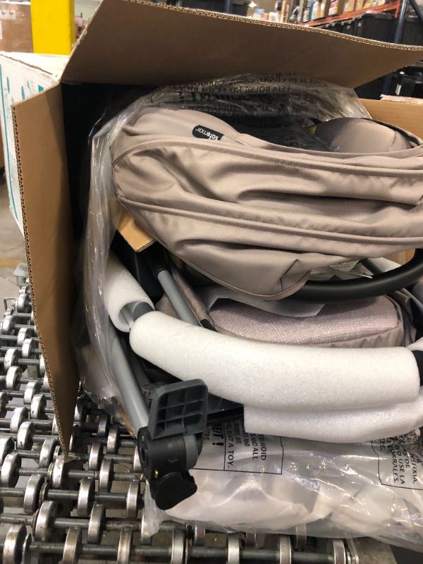 Photo 1 of Evenflo Pivot Modular Travel System with SafeMax Infant Car Seat - Sandstone