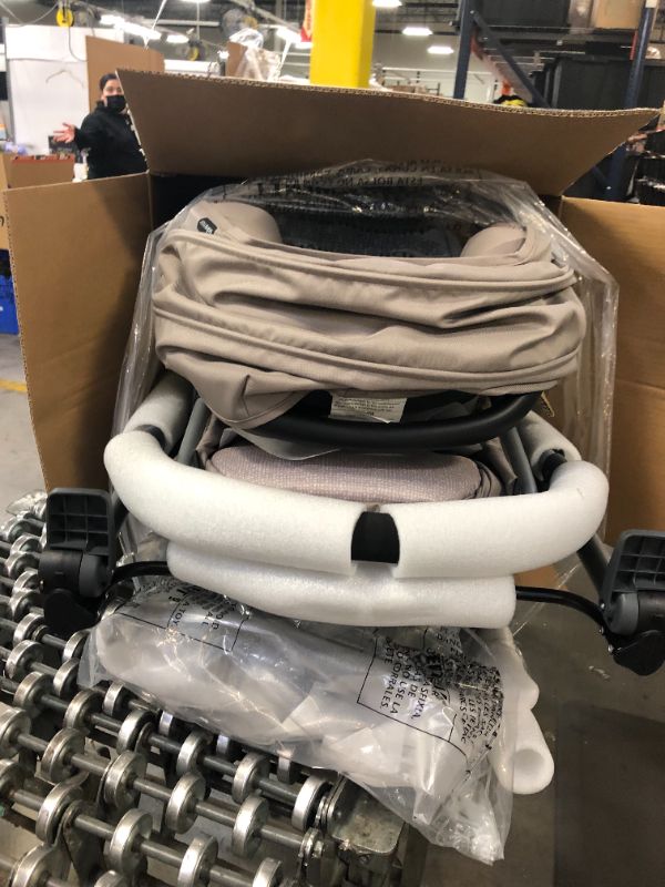 Photo 1 of Evenflo Pivot Modular Travel System with SafeMax Infant Car Seat - Sandstone
