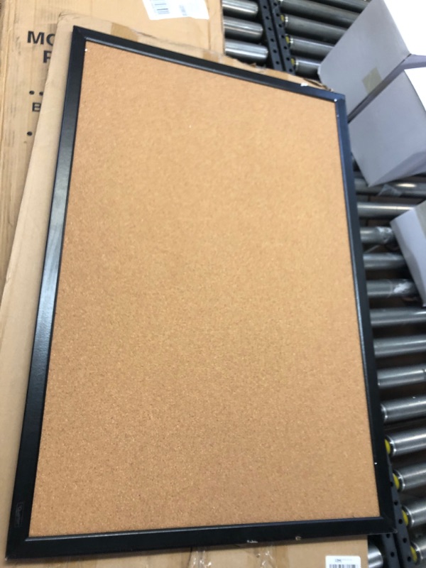 Photo 1 of 24x36 cork board frame has small damage