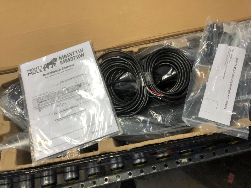 Photo 1 of Mighty Mule MM372W Medium Dual Gate Opener