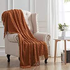 Photo 1 of 51 x 30 inches decorative throw blanket color light brown/ rust 