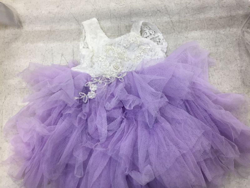 Photo 1 of young girls dress puffy bottom color purple and white size 3 T 