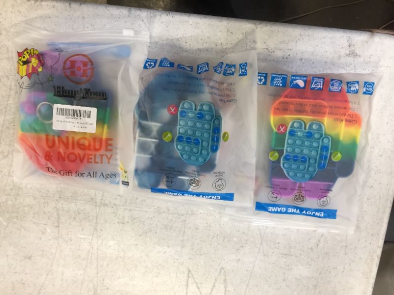Photo 1 of bundle of 3 kid pop toys 