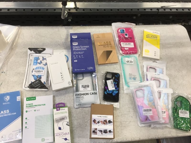 Photo 1 of phone screen protectors and variety of phone cases 