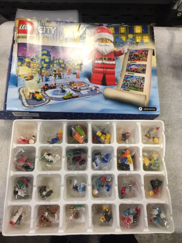 Photo 2 of LEGO City Advent Calendar 60303 Building Kit; Includes City Play Mat; Best Christmas Toys for Kids; New 2021 (349 Pieces)

