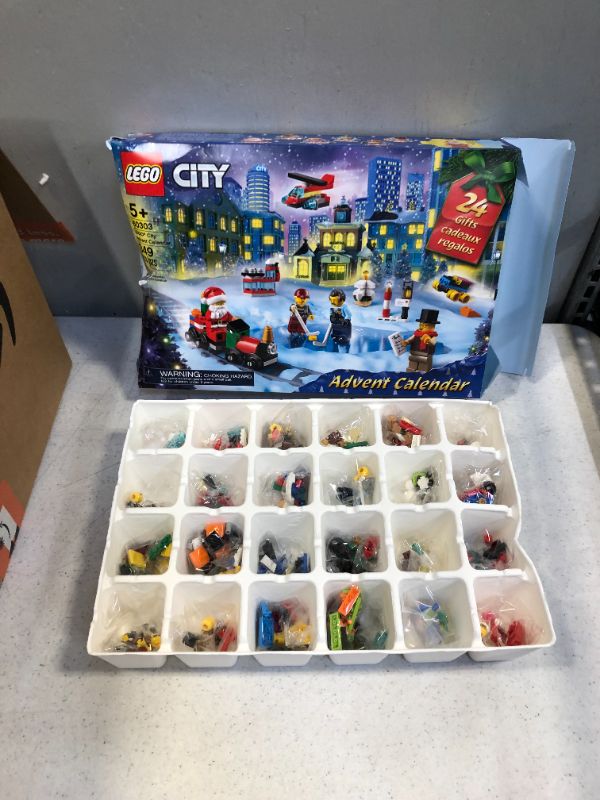 Photo 2 of LEGO City Advent Calendar 60303 Building Kit; Includes City Play Mat; Best Christmas Toys for Kids; New 2021 (349 Pieces)