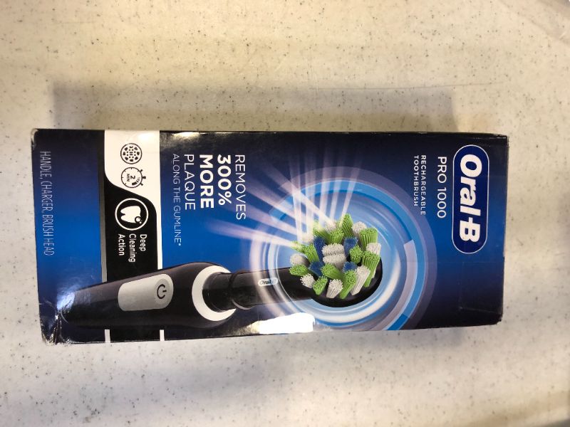 Photo 3 of Oral-B Pro 1000 CrossAction Electric Toothbrush, Black
