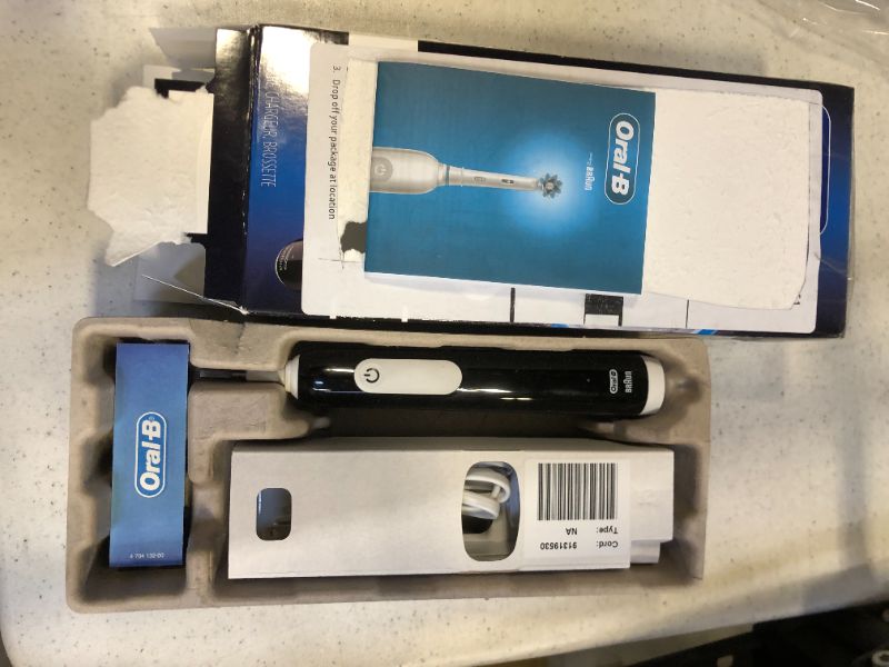 Photo 2 of Oral-B Pro 1000 CrossAction Electric Toothbrush, Black
