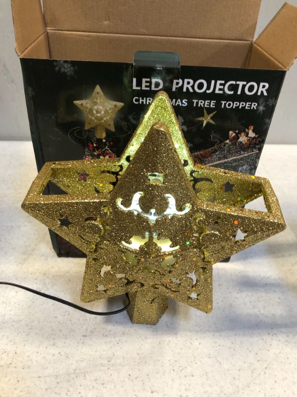 Photo 3 of Christmas Tree Topper Projector, LED Star Tree Topper Light , Glitter Gold Star Topper Projector with Rotating Star Projection for Indoor Christmas Tree Decor, Xmas Decorations
