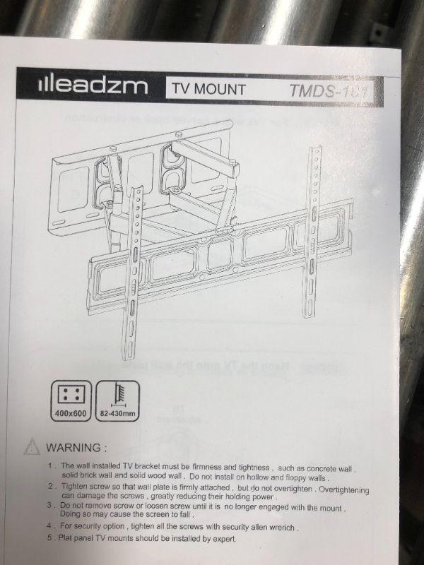 Photo 1 of TV Wall Mount Swivel and Tilt Full Motion TV Mount for 37-70 Inch Flat Screen TV, TV Wall Mounts Bracket with Articulating Swivel Dual Arms, Max VESA 600x400mm, 99 lbs. Loading, Fits 16" Studs ELIVED
