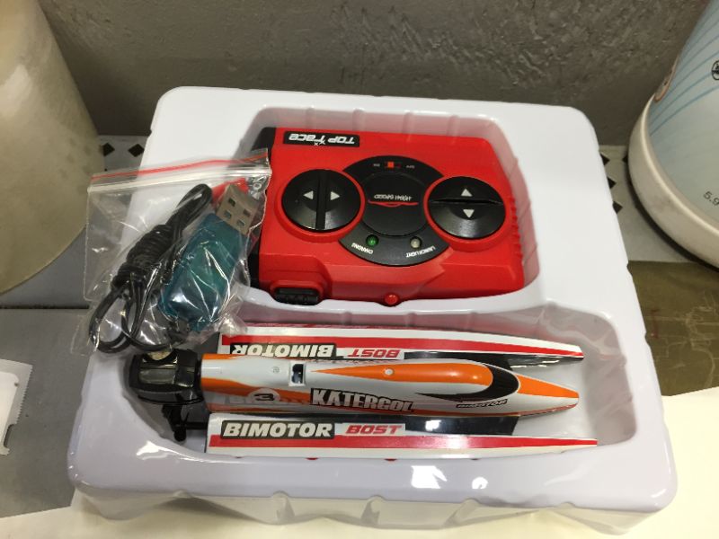 Photo 1 of Gizmovine Mini Remote Control Boat for Kids Age 5-9 , Fast Rc Boats for Pools Racing Submarine Water Toys Adults Kids Gift, Orange Upate Version
