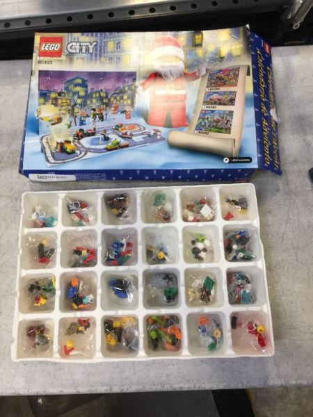 Photo 2 of LEGO City Advent Calendar 60303 Building Kit; Includes City Play Mat; Best Christmas Toys for Kids; New 2021 (349 Pieces)
