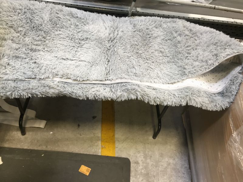 Photo 1 of AREA RUG NON SLIP 
4FT X 4FT 