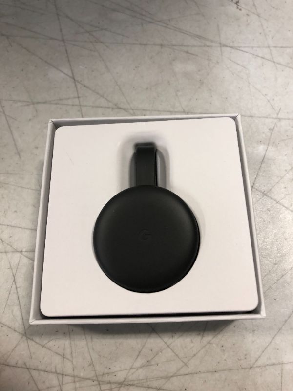 Photo 3 of Google Chromecast - Streaming Device with HDMI Cable - Stream Shows, Music, Photos, and Sports from Your Phone to Your TV
