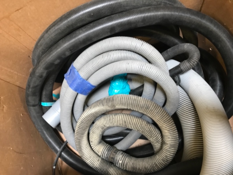 Photo 2 of  VARIOUS VACUUM STYLE HOSES.  3in DIA GREY VACUUM STYLE HOSE.  2.5in ROTO BRUSH STYLE VACUUM HOSE.ASSORTED 2in DIA AND SMALLER VACUUM HOSES. 2 METAL VACUUM TUBES  EXACT LENGTH OF HOSES UNKNOWN.  