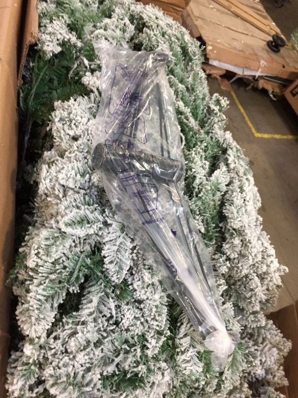 Photo 3 of 9ft. Slim Flocked Montreal Fir Artificial Christmas Tree with 600 Warm White LED Lights and 1860 Bendable Branches
