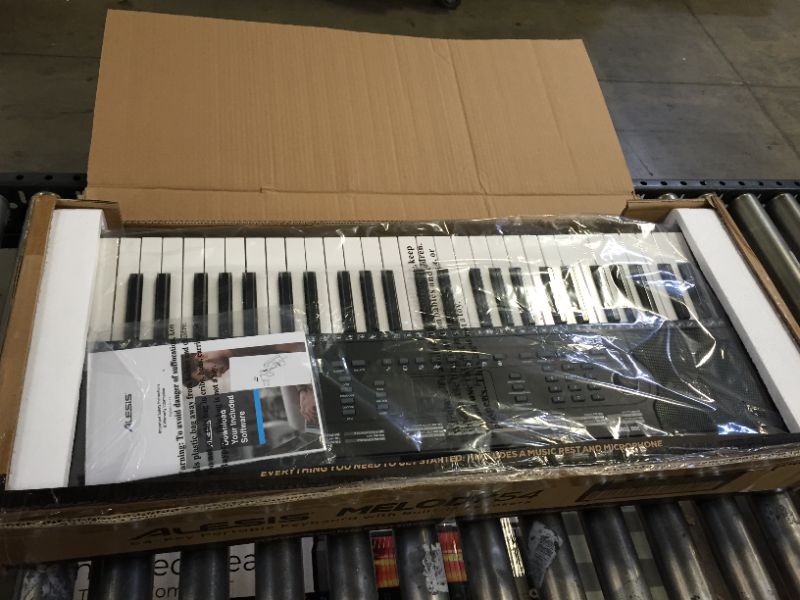 Photo 2 of Alesis 54-Key Electric Keyboard Piano with Speakers Microphone Music Rest Edu...
