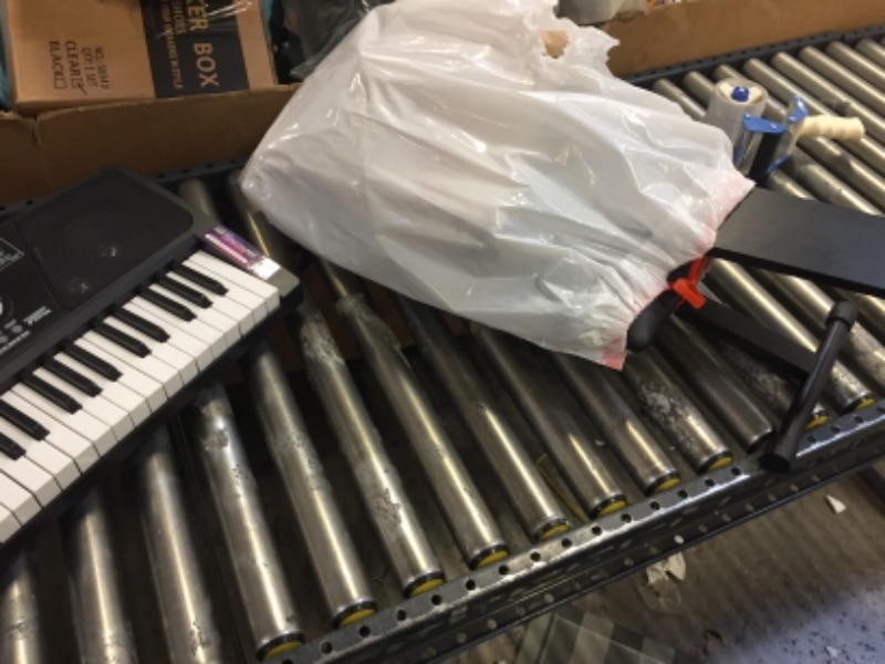 Photo 1 of RockJam 61 Key Keyboard Piano With LCD Display Kit, Keyboard Stand, Piano Bench, Headphones, Simply Piano App & Keynote Stickers
