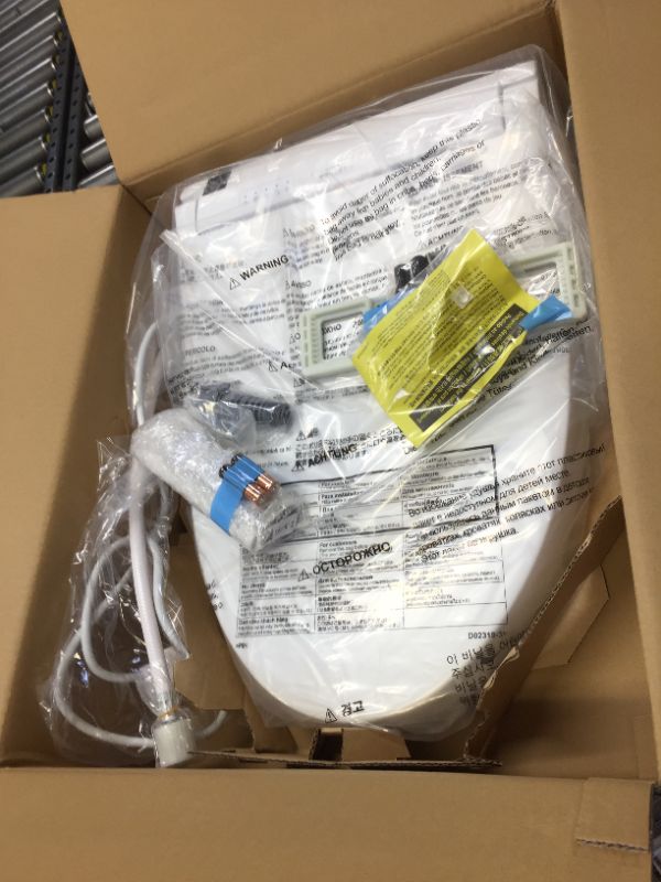 Photo 1 of TOTO SW3084#01 WASHLET C5 Electronic Bidet Toilet Seat with PREMIST and EWATER+ Wand Cleaning, Elongated, Cotton White
